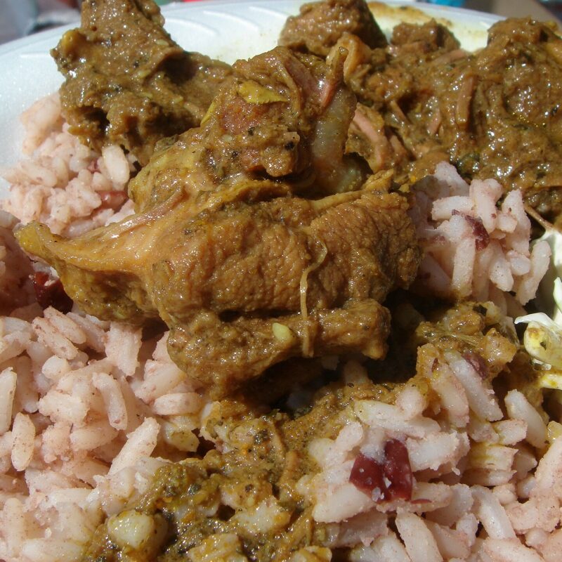 Curry goat over rice